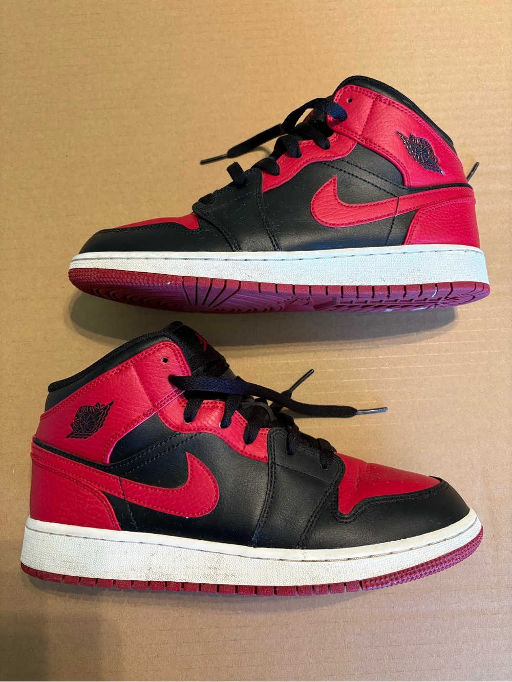 Nike Jordan 1 Black and Red Mid-Top Basketball Sneakers